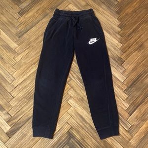 Kids size: small Nike black joggers.